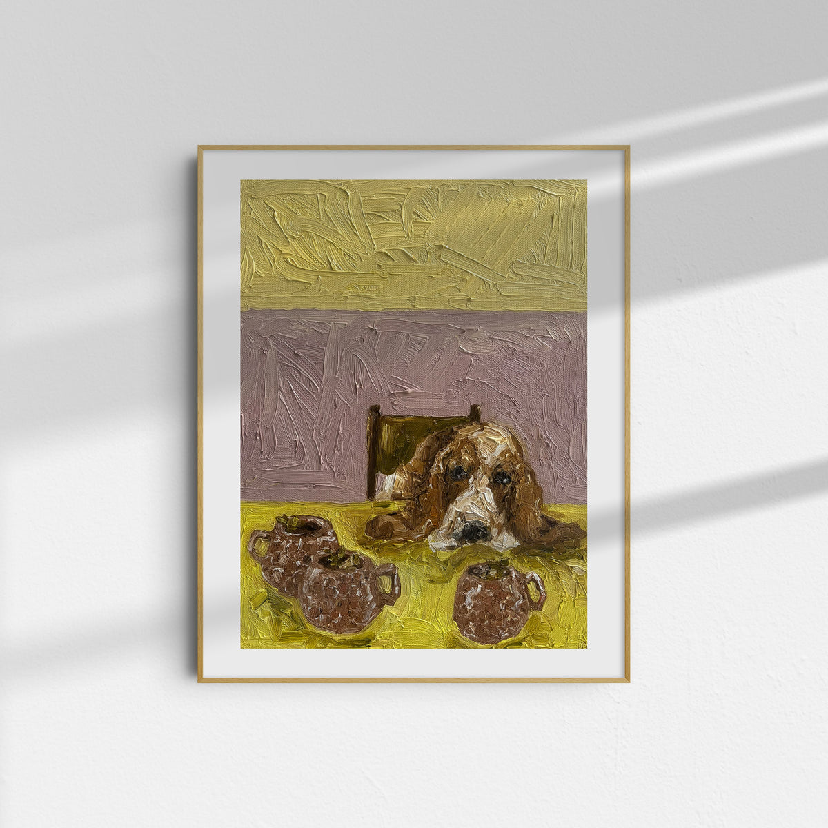 Limited edition Giclee print of "Moscow Mule" by Leah Boyd, featuring a dog resting its head on a table beside two brown jugs. The painting’s textured background blends yellow and purple tones, while the elegant frame casts subtle shadows against a white wall, beautifully capturing the charm of the original artwork.