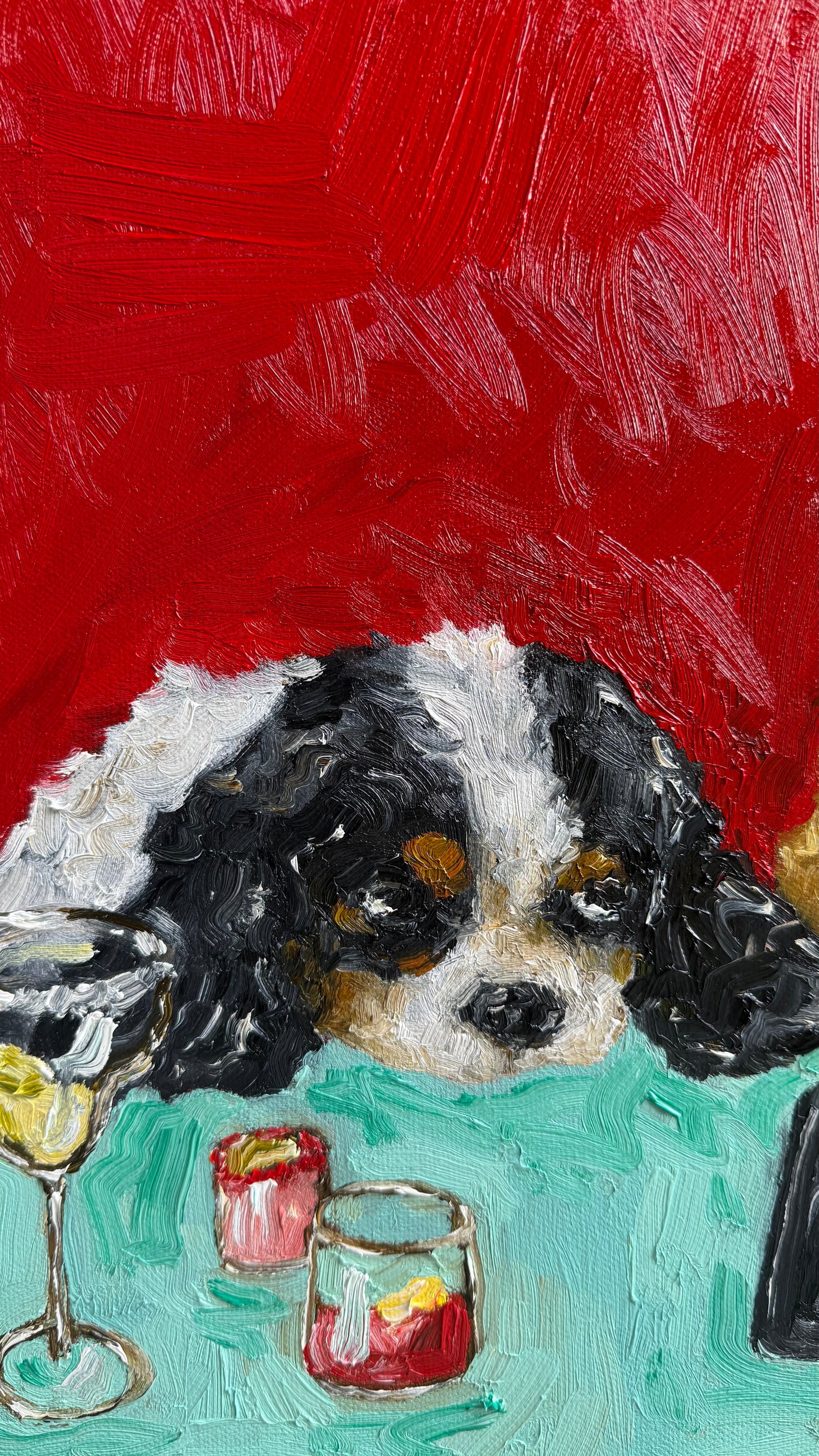 Yappy Hour“ by Leah Boyd is an evocative canvas art piece featuring a black, white, and brown dog resting its head on a teal table with cocktails in front, set against a bold red background—perfect for any collection.