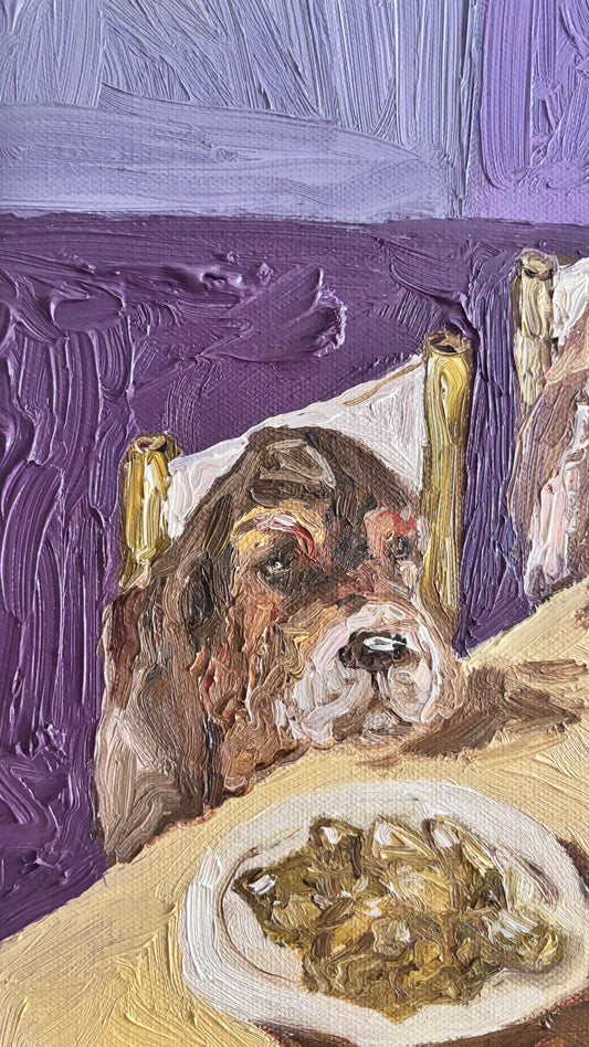 A close-up of Leah Boyd’s "Basset Hounds & Artichokes," an original oil painting featuring a brown dog at a table near a plate of food, set against textured purple and beige—a perfect piece for Basset Hound art lovers.