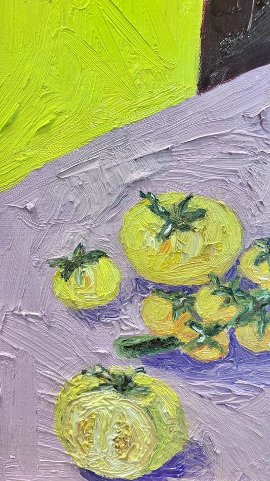 "Harvest in Yellow" by Leah Boyd is an expressive, signed original oil painting featuring yellow tomatoes on a light purple surface against a bold yellow and dark background, created with visible thick brushstrokes.