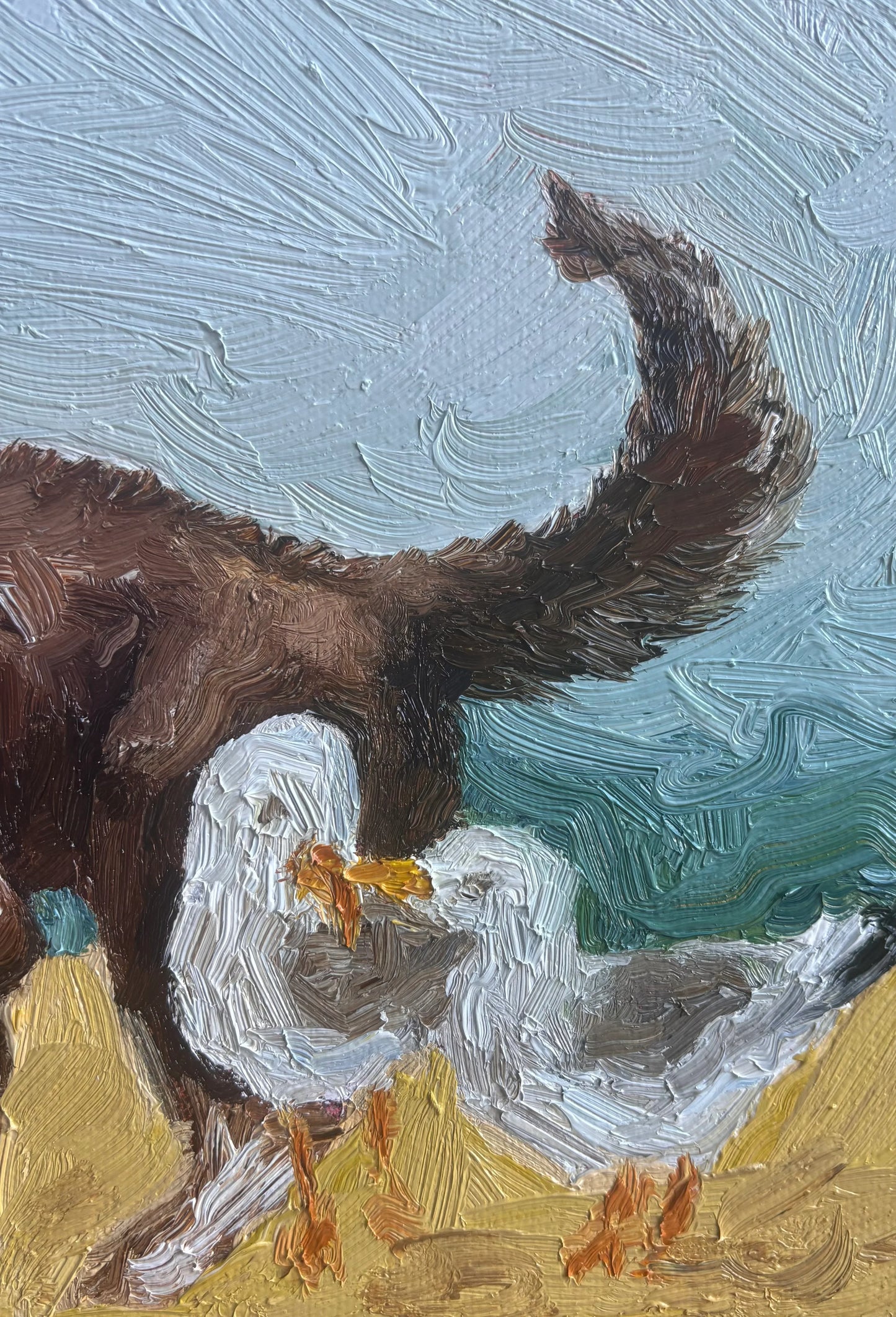 A close-up oil painting by Leah Boyd titled "Beach Day" shows a brown dog with its tail raised on sandy ground under a blue sky and two seagulls looking at each other.