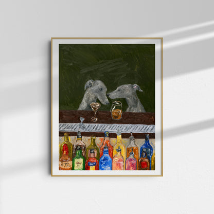 Bar Scene [PRINT PREORDER] by Leah Boyd is a framed oil-on-canvas reproduction depicting two gray dogs sitting across from each other at a bar, with an array of colorful bottles displayed on the counter before them. The background features a rich dark green hue, and soft lighting creates gentle shadows on the wall.