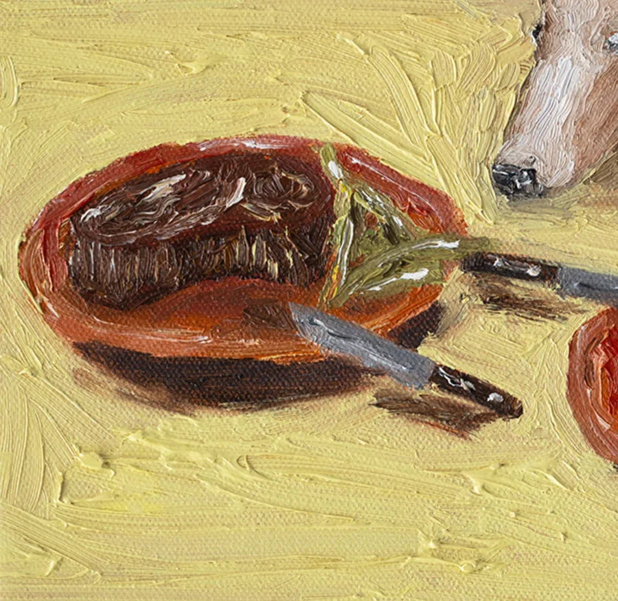 A close-up of Leah Boyd’s "Dinner for One no. 13: Steak Dinner and Borzoi" shows a partially sliced steak with cutlery, set against a textured yellow background featuring part of a Borzoi's snout—unique steak dinner art.