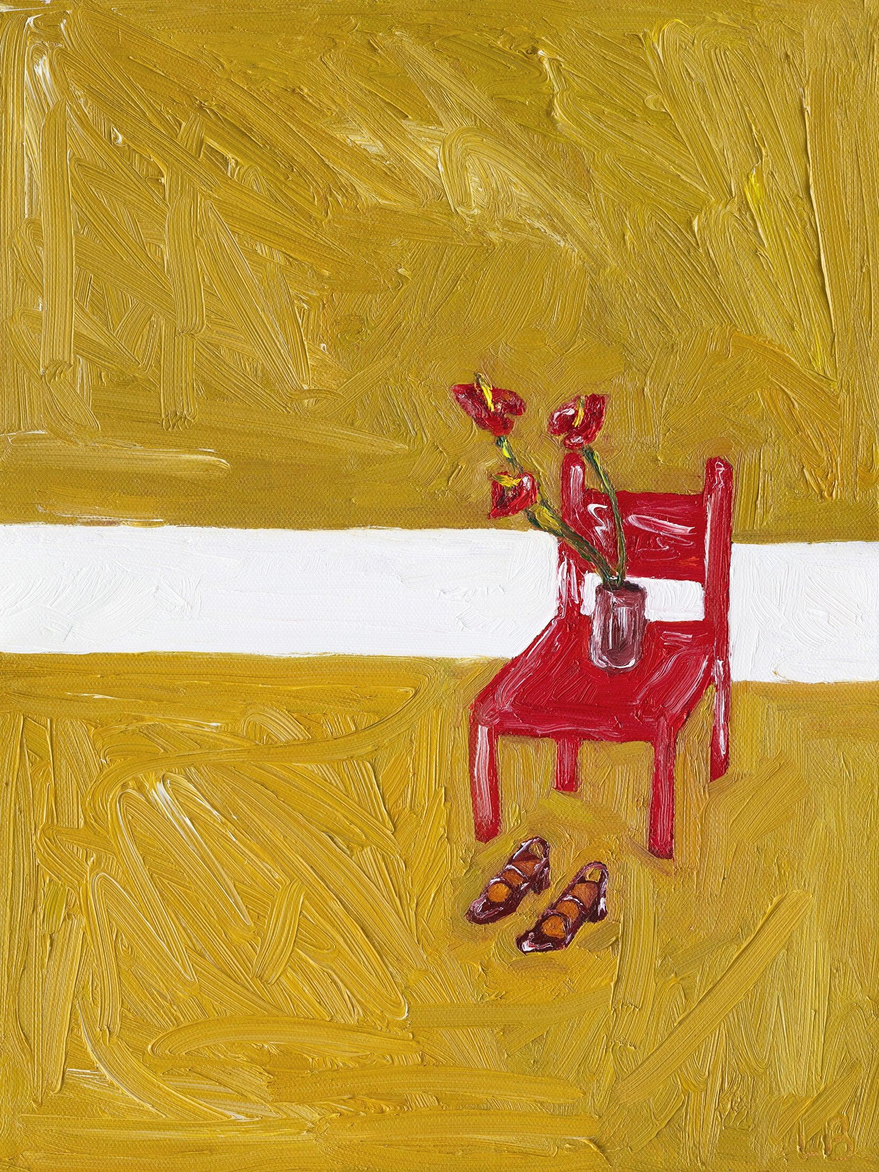 A red chair with a vase of red flowers sits on a textured yellow floor with a white stripe. Leah Boyd's Carel Paris Shoes are placed in front, creating an abstract, painterly scene reminiscent of canvas oil art.