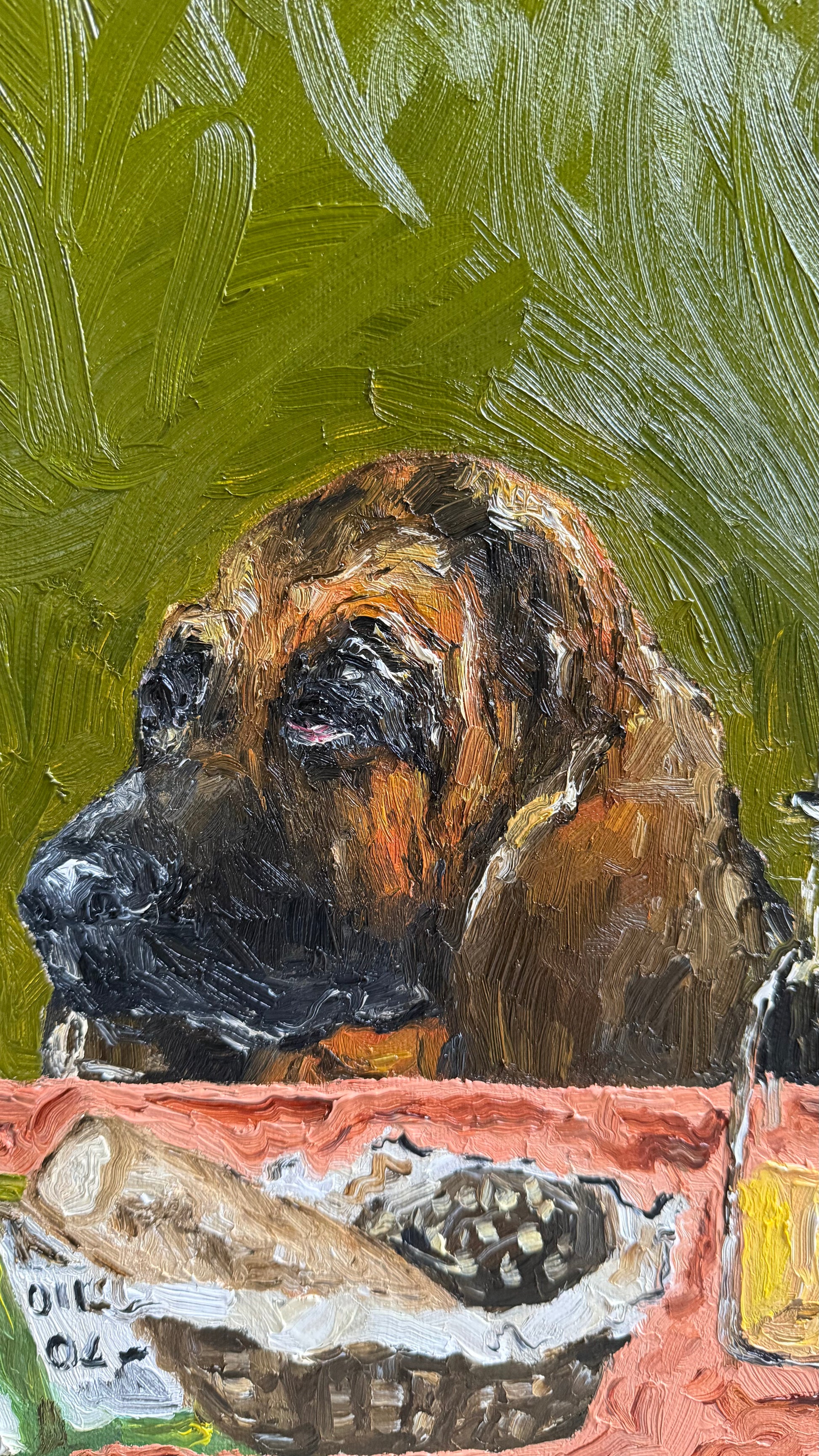 Complimentary Bread by Leah Boyd is an original oil painting depicting a brown dog sitting at a table with a bread basket, pinecone, and condiment bottle. Featuring a green background with lively, textured brushstrokes, this signed canvas artwork is ideal for collectors of unique art.