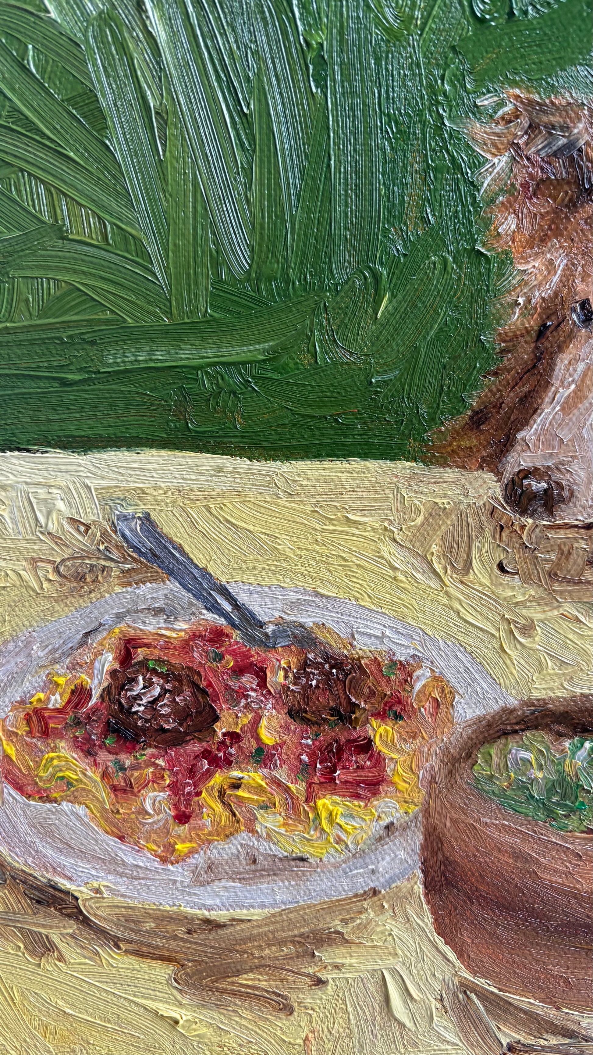 Sheltie & Spaghetti by Leah Boyd is a textured oil painting featuring spaghetti with meatballs, a green salad, and the charming touch of a Sheltie’s furry face in the corner.