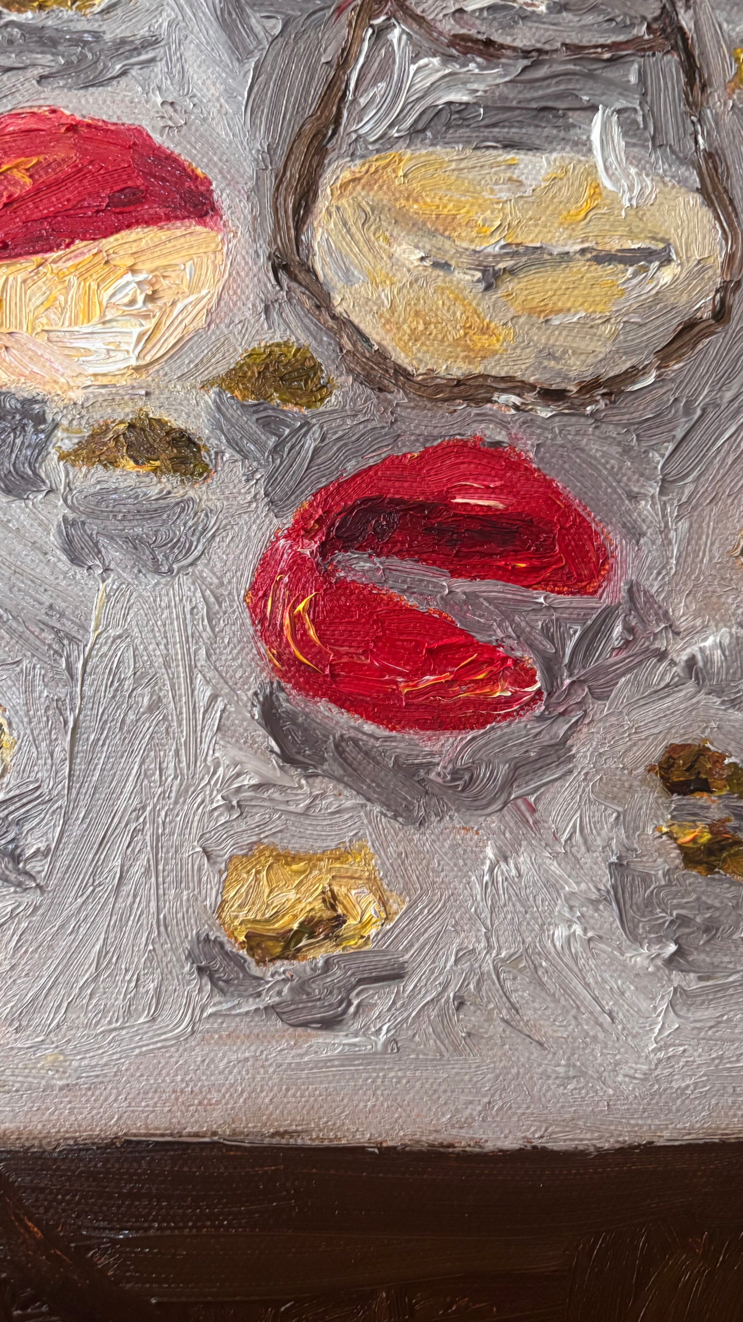 Close-up of "Memories of My Mother" by Leah Boyd: a textured original oil painting on canvas featuring lips-like red forms, yellow shapes, and part of a round glass with light liquid against a grayish background.