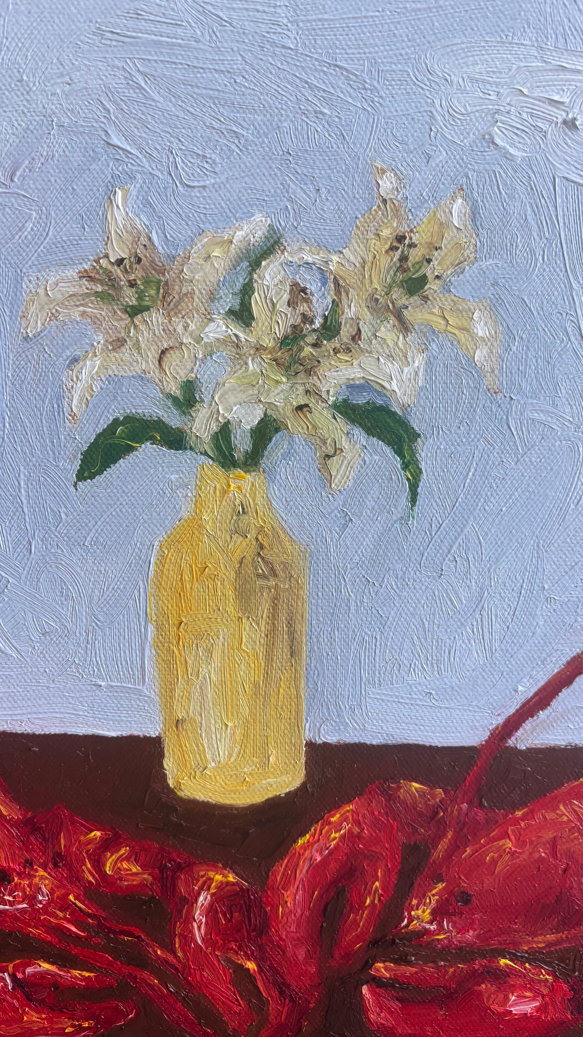 Leah Boyd’s 'Til Death Do Us Part or Consider the Lobster is an original, signed oil painting of white lilies in a yellow vase on dark red cloth with a light blue textured background—ready to hang canvas art.