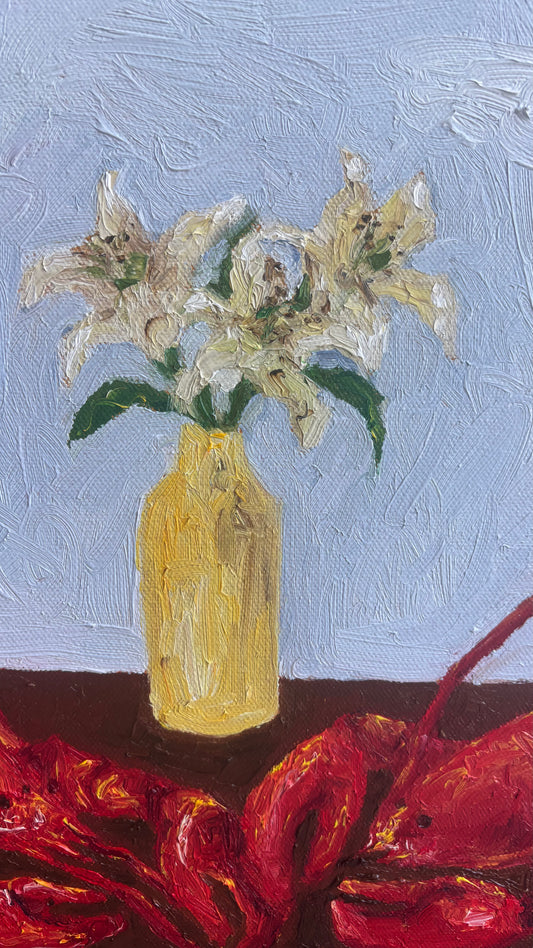 Leah Boyd’s 'Til Death Do Us Part or Consider the Lobster is an original, signed oil painting of white lilies in a yellow vase on dark red cloth with a light blue textured background—ready to hang canvas art.