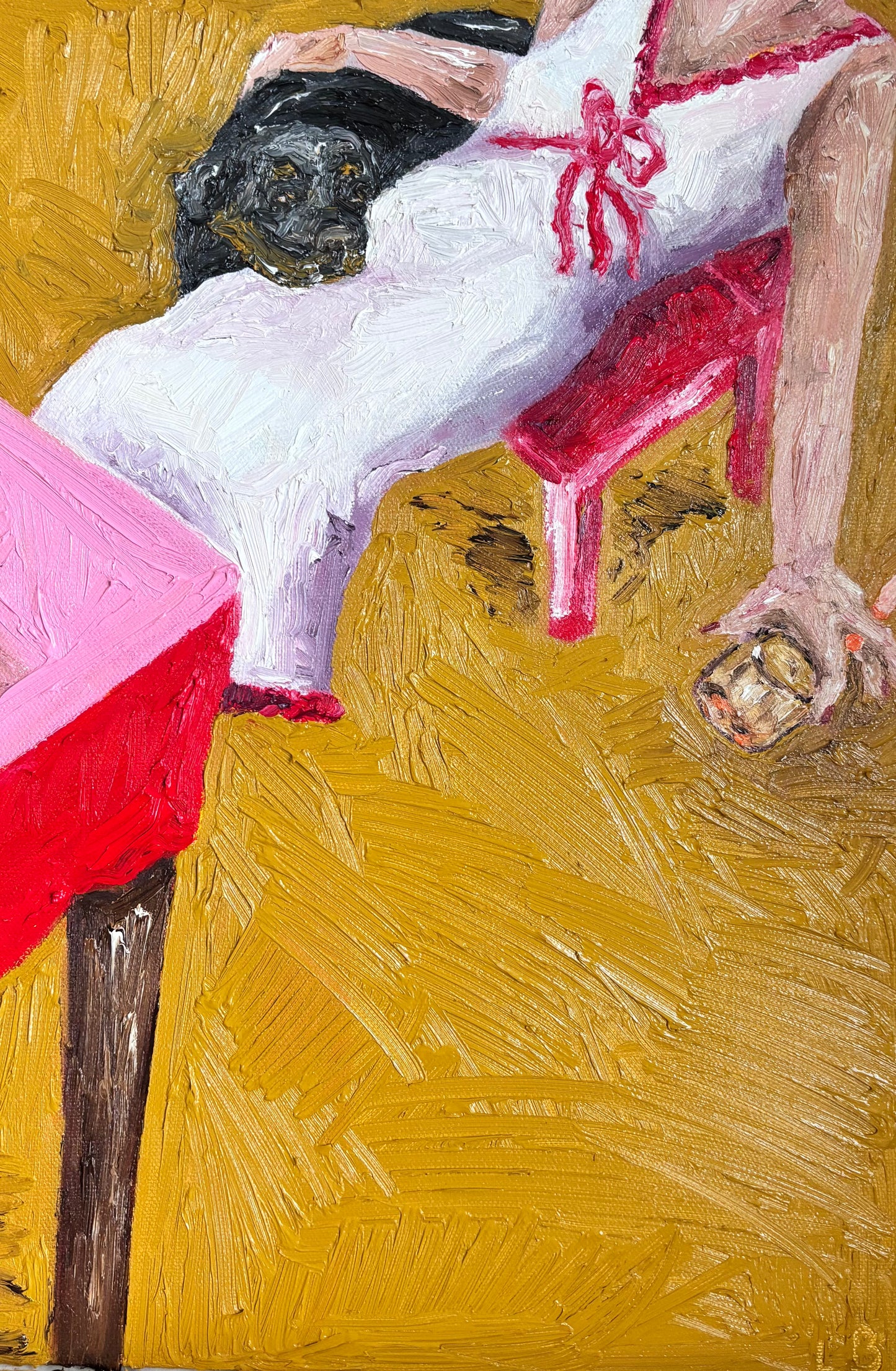 After the Party" by Leah Boyd is a vibrant oil painting featuring a person in a white dress with a red bow, seated on a red chair. One arm rests on a pink table, while the other holds a round object, set against bold yellow brushstrokes.