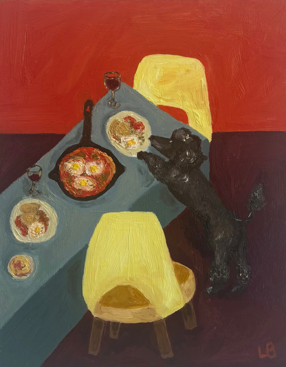 In Leah Boyd’s "Dinner for One no. 5: Shakshuka," a black dog stands on its hind legs, reaching for food on a blue table with pasta, Shakshuka, and wine. Two yellow chairs and a vivid red-purple background complete this oil painting on cradled wood panel.