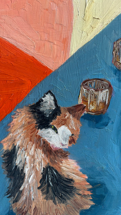 Whiskers, Whisky, and Lobster" by Leah Boyd is an original oil on cradled wood panel, depicting a calico cat on blue with two glass cups and a background of bold red, yellow, and cream.