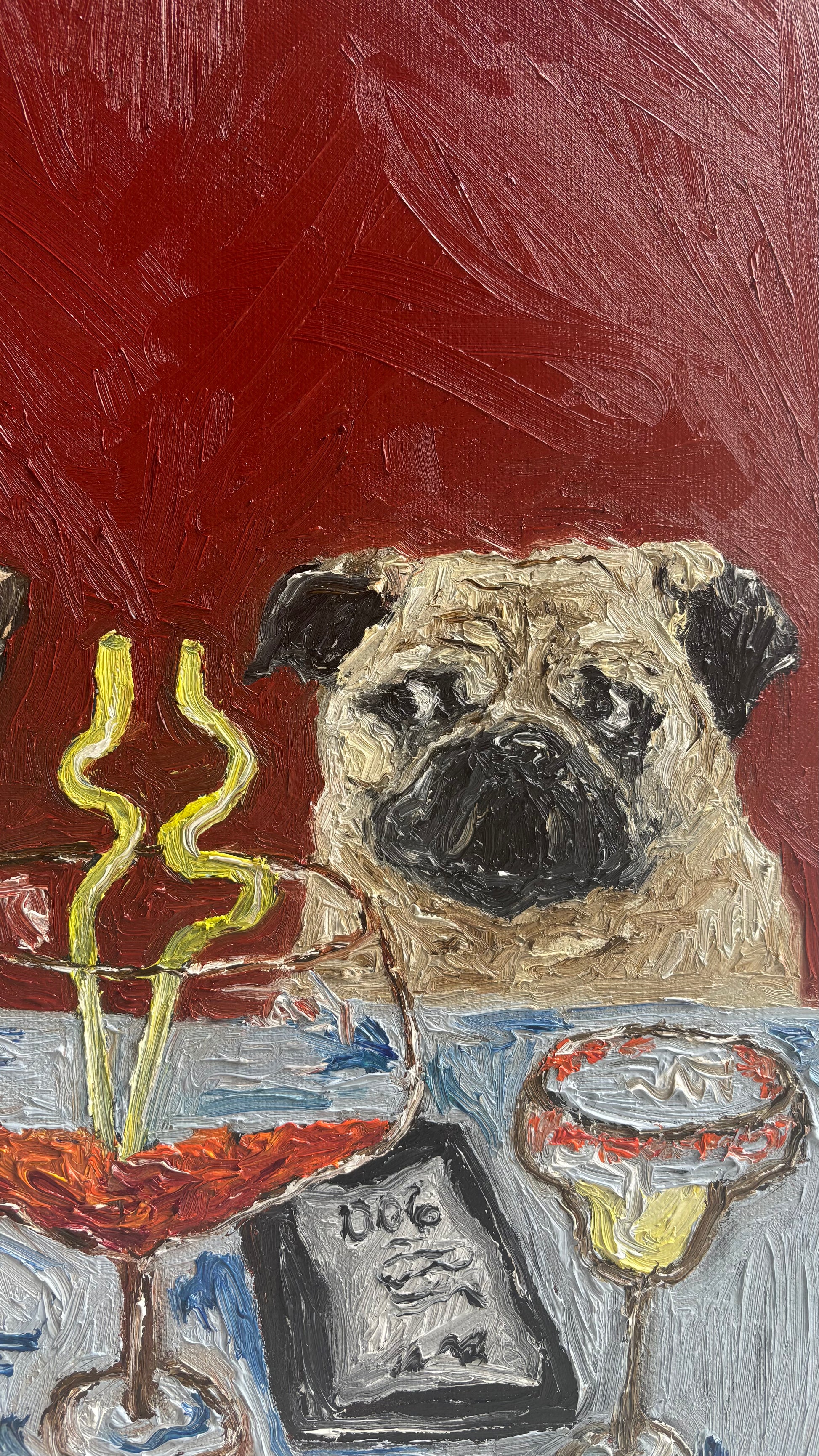 A painted pug sits at a table with colorful drinks, a dish, and a menu against a red background in "Designated Driver," an original oil painting by Leah Boyd. Perfect as canvas art for any space, this signed artwork captures playful elegance and vibrant detail.