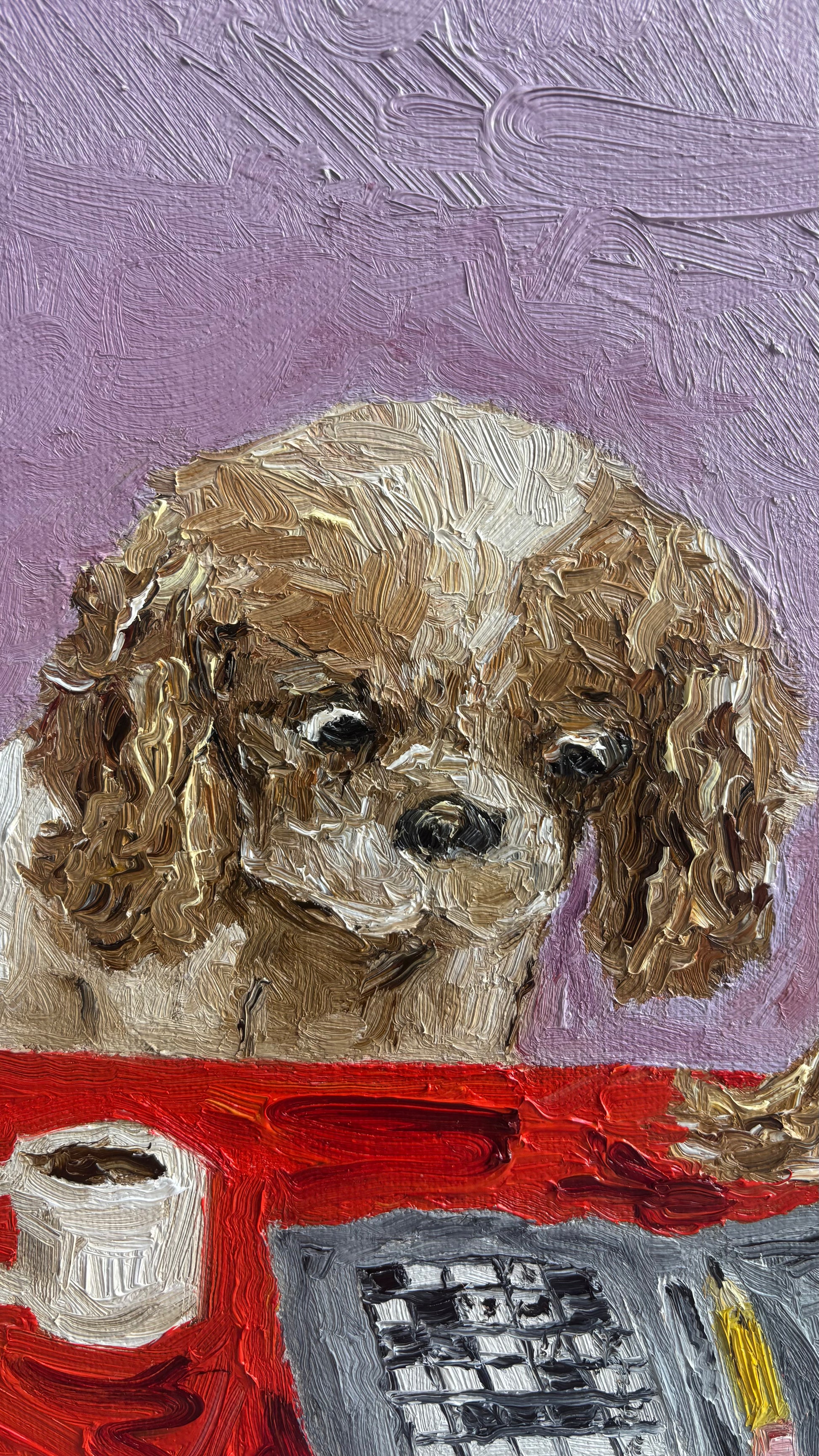 Leah Boyd’s “Cavalier Conundrum” is a signed original oil painting depicting a brown and white curly-furred dog seated at a red table beside a cup and what appears to be a keyboard, set against a vibrant purple background. This artwork captures the whimsical spirit of its subject in vivid color and intricate detail.