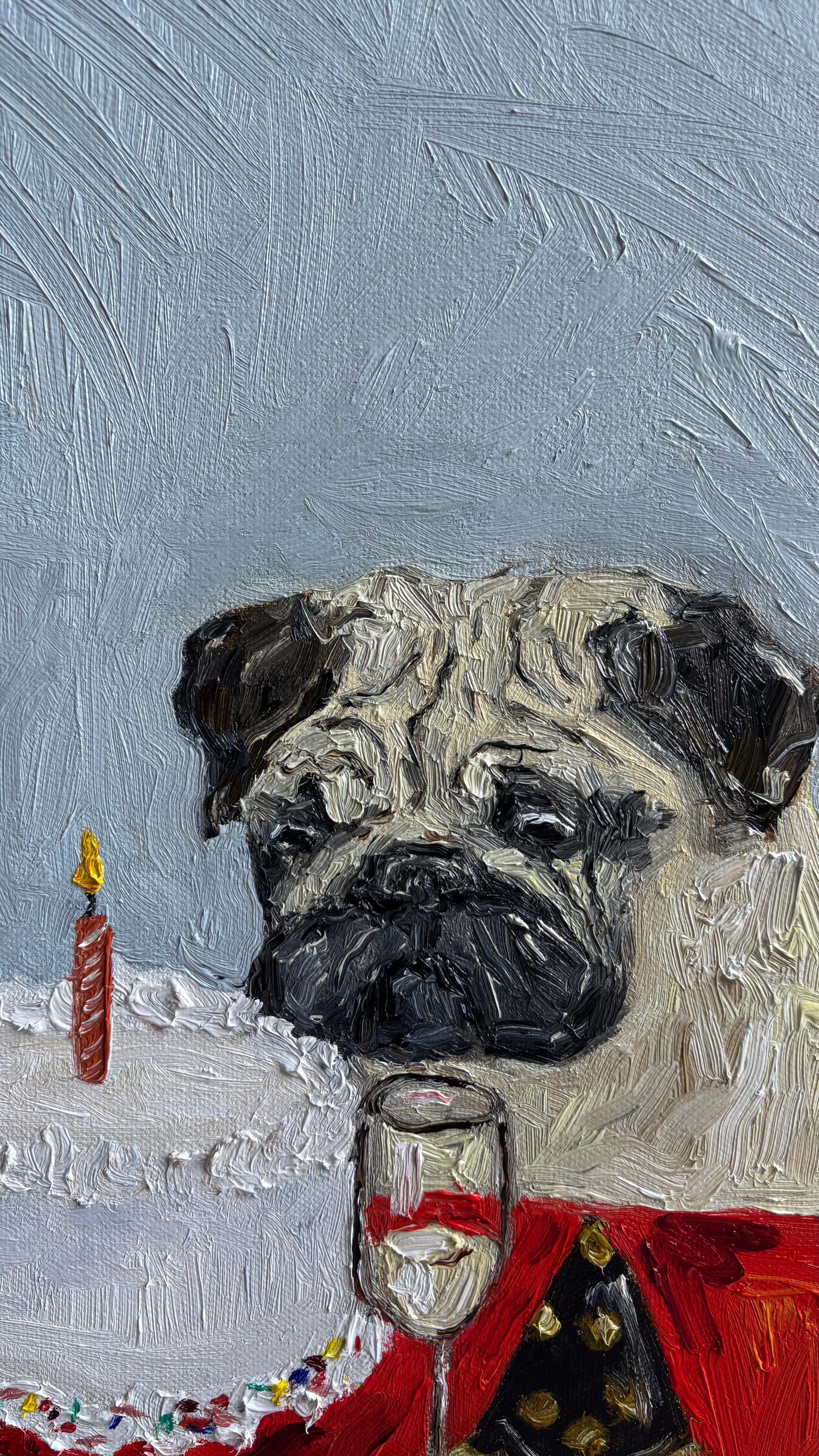 Birthday Blues by Leah Boyd is an original oil painting on canvas that features a pug dressed in red, seated in front of a birthday cake with a lit candle and a glass, all set against a textured light gray background. The artwork subtly conveys the mood of Birthday Blues.