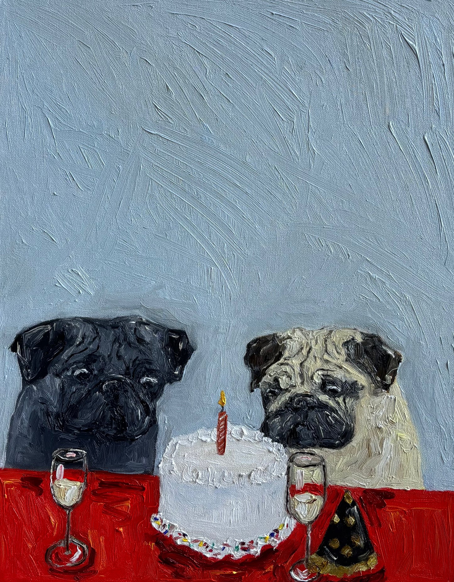 Two pugs sit at a red table, gazing at a white frosted cake with a single lit candle, surrounded by glasses and a party hat, all set against a textured gray backdrop—beautifully capturing the whimsical spirit of “Birthday Blues” by Leah Boyd in this charming canvas art.