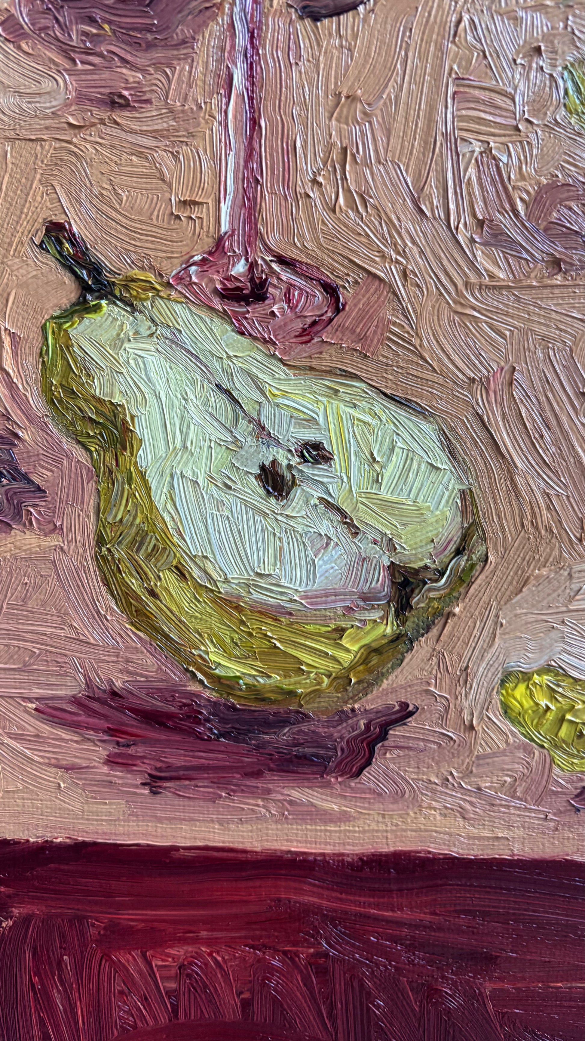 "Pears & Pepperoncini" by Leah Boyd is an original impressionist oil painting featuring a green pear and partial wine glass on a pink table, with textured brushstrokes highlighting the beauty of pears and pepperoncini.