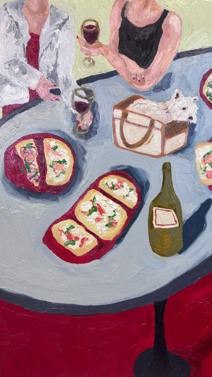 Dinner for One no. 8: Purse Pup by Leah Boyd is an original oil painting on cradled gesso-board featuring two women, flatbread pizzas, red wine, and a small white dog in a tan bag. Includes certificate of authenticity.