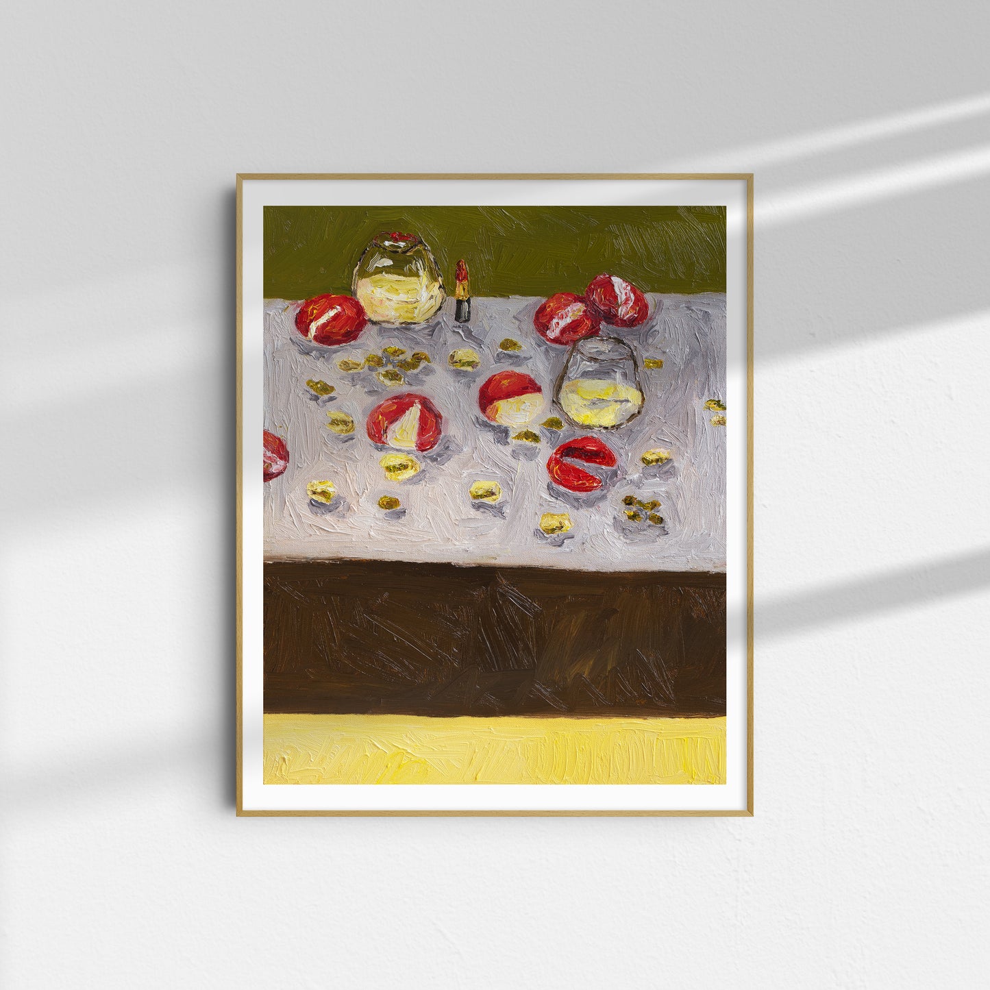 Memories of My Mother" by Leah Boyd is a limited edition framed Giclee print featuring red and yellow fruits on a textured surface in impressionist style, displayed on a white wall with sunlight casting soft shadows.