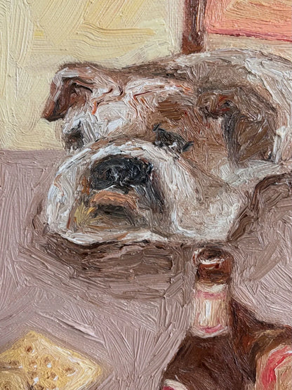 "After Work Blues" by Leah Boyd is an original oil painting featuring a bulldog near a beer bottle and crackers, with textured brushstrokes in earthy tones. This artwork comes ready to hang.